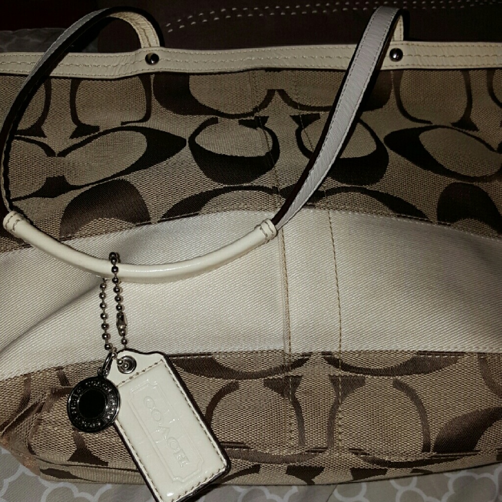 Coach purse tan white color